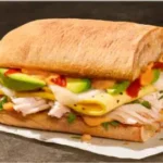 Chipotle Chicken, Scrambled Egg & Avocado on Ciabatta